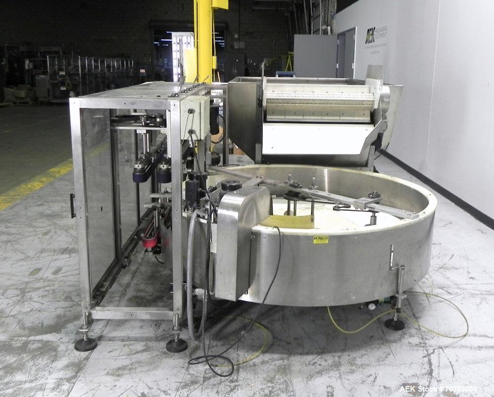 Used New England Model NEHHLP-72 Bottle Unscrambler. Has 72" (diameter) sorting bowl. Is currently set for 36 oz rectangular bottles. Includes New England 100-H/E Hopper. Low profile design and stain...
