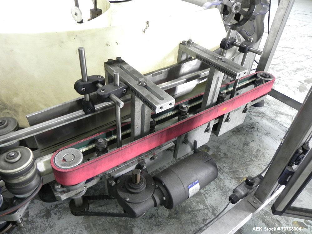 Used New England Model NEHHLP-72 Bottle Unscrambler. Has 72" (diameter) sorting bowl. Is currently set for 36 oz rectangular bottles. Includes New England 100-H/E Hopper. Low profile design and stain...