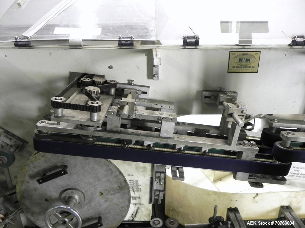 Used New England Model NEHHLP-72 Bottle Unscrambler. Has 72" (diameter) sorting bowl. Is currently set for 36 oz rectangular bottles. Includes New England 100-H/E Hopper. Low profile design and stain...