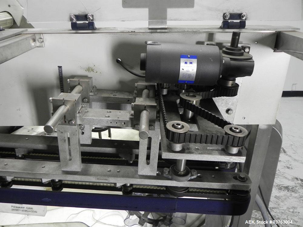 Used New England Model NEHHLP-72 Bottle Unscrambler. Has 72" (diameter) sorting bowl. Is currently set for 36 oz rectangular bottles. Includes New England 100-H/E Hopper. Low profile design and stain...