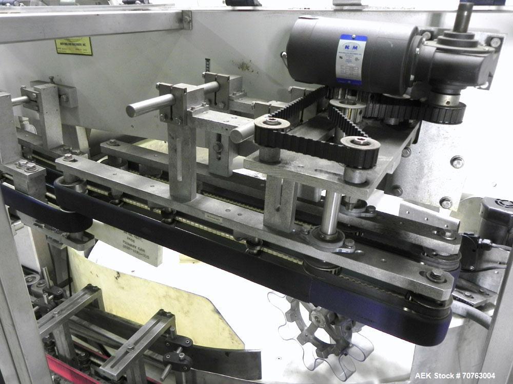 Used New England Model NEHHLP-72 Bottle Unscrambler. Has 72" (diameter) sorting bowl. Is currently set for 36 oz rectangular bottles. Includes New England 100-H/E Hopper. Low profile design and stain...