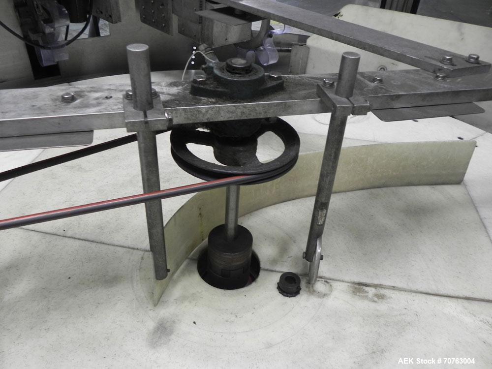 Used New England Model NEHHLP-72 Bottle Unscrambler. Has 72" (diameter) sorting bowl. Is currently set for 36 oz rectangular bottles. Includes New England 100-H/E Hopper. Low profile design and stain...