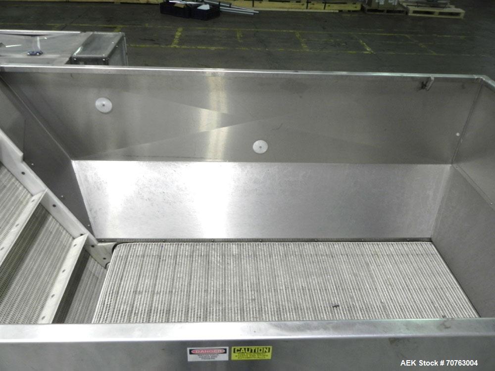 Used New England Model NEHHLP-72 Bottle Unscrambler. Has 72" (diameter) sorting bowl. Is currently set for 36 oz rectangular bottles. Includes New England 100-H/E Hopper. Low profile design and stain...