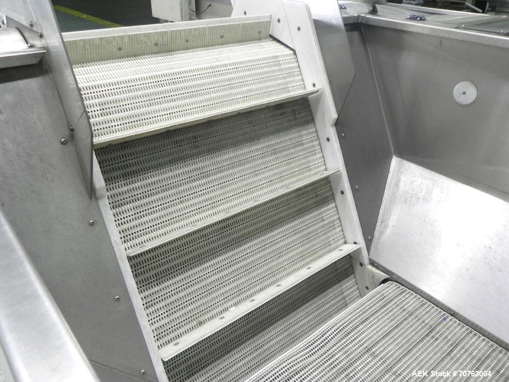 Used New England Model NEHHLP-72 Bottle Unscrambler. Has 72" (diameter) sorting bowl. Is currently set for 36 oz rectangular bottles. Includes New England 100-H/E Hopper. Low profile design and stain...