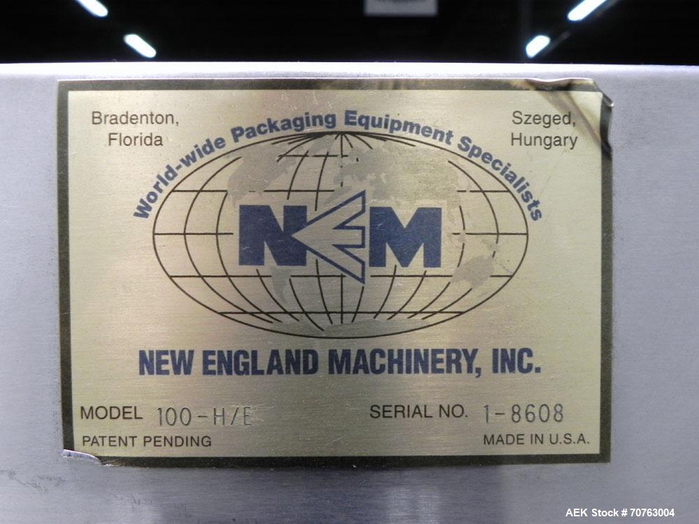 Used New England Model NEHHLP-72 Bottle Unscrambler. Has 72" (diameter) sorting bowl. Is currently set for 36 oz rectangular bottles. Includes New England 100-H/E Hopper. Low profile design and stain...