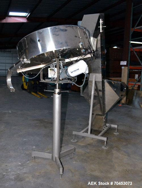Used Mengibar 44” Diameter Bottle Unscrambler, Model MI-2, Serial #306015, Built 1997. Includes an integrated elevator, model EC300/2000, serial #306015. SELLING PRICE AS IS, WHERE IS, SANFORD, NC.