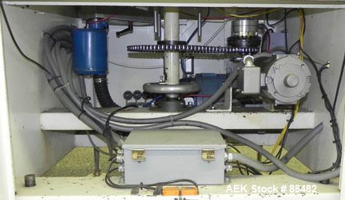 Used Omega Design Bottle Unscrambler, Model 2D1RPC8. 8 Station, Allen-Bradley SLC 5/03 PLC controls. Air cleaner, has Palace bottle elevator with 12" x 12" x 3" high cleats, approximate 72" discharge...