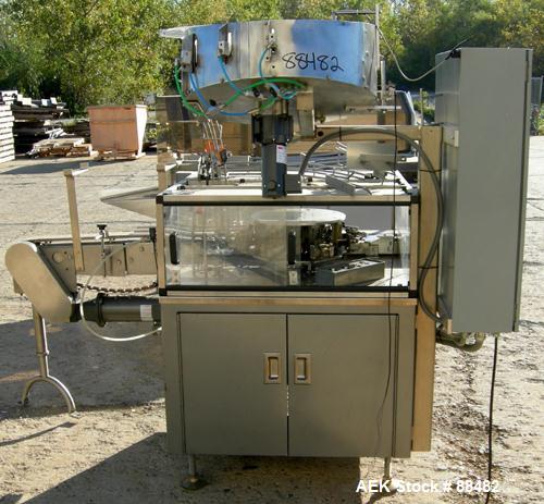 Used Omega Design Bottle Unscrambler, Model 2D1RPC8. 8 Station, Allen-Bradley SLC 5/03 PLC controls. Air cleaner, has Palace bottle elevator with 12" x 12" x 3" high cleats, approximate 72" discharge...