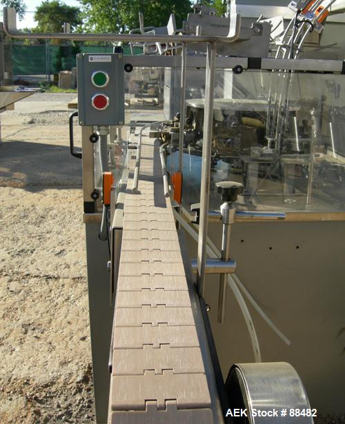 Used Omega Design Bottle Unscrambler, Model 2D1RPC8. 8 Station, Allen-Bradley SLC 5/03 PLC controls. Air cleaner, has Palace bottle elevator with 12" x 12" x 3" high cleats, approximate 72" discharge...