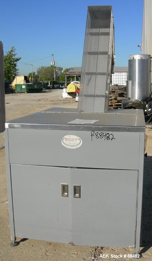Used Omega Design Bottle Unscrambler, Model 2D1RPC8. 8 Station, Allen-Bradley SLC 5/03 PLC controls. Air cleaner, has Palace bottle elevator with 12" x 12" x 3" high cleats, approximate 72" discharge...