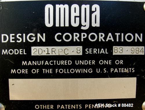 Used Omega Design Bottle Unscrambler, Model 2D1RPC8. 8 Station, Allen-Bradley SLC 5/03 PLC controls. Air cleaner, has Palace bottle elevator with 12" x 12" x 3" high cleats, approximate 72" discharge...
