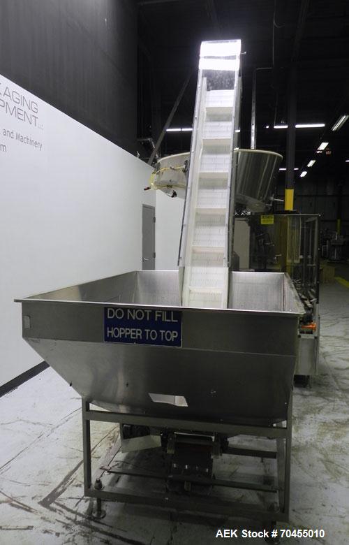 Used Omega Design Corp Model 4D-RP2-12 Bulk Bottle Unscrambler. Capable of speeds over 200 bottles per minute. Set up with 12 rotary pockets. Has 4' (48") diameter bowl sorter with integrated bulk bo...