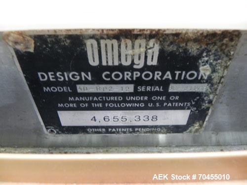Used Omega Design Corp Model 4D-RP2-12 Bulk Bottle Unscrambler. Capable of speeds over 200 bottles per minute. Set up with 12 rotary pockets. Has 4' (48") diameter bowl sorter with integrated bulk bo...