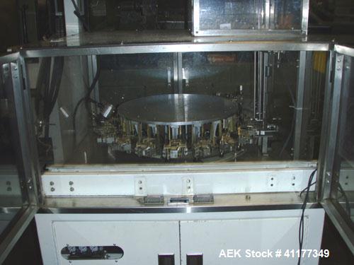 Used Omega Design Bulk Bottle Unscrambler, Model 4D-RP2-18. Capable of speeds over 250 BPM. Has exterior bottle air cleaner, bulk bottle elevator. 1/60/120V.