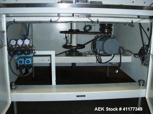 Used Omega Design Bulk Bottle Unscrambler, Model 4D-RP2-18. Capable of speeds over 250 BPM. Has exterior bottle air cleaner, bulk bottle elevator. 1/60/120V.