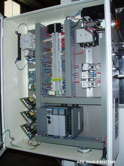 Used Omega Design Bulk Bottle Unscrambler, Model 4D-RP2-18. Capable of speeds over 250 BPM. Has exterior bottle air cleaner, bulk bottle elevator. 1/60/120V.