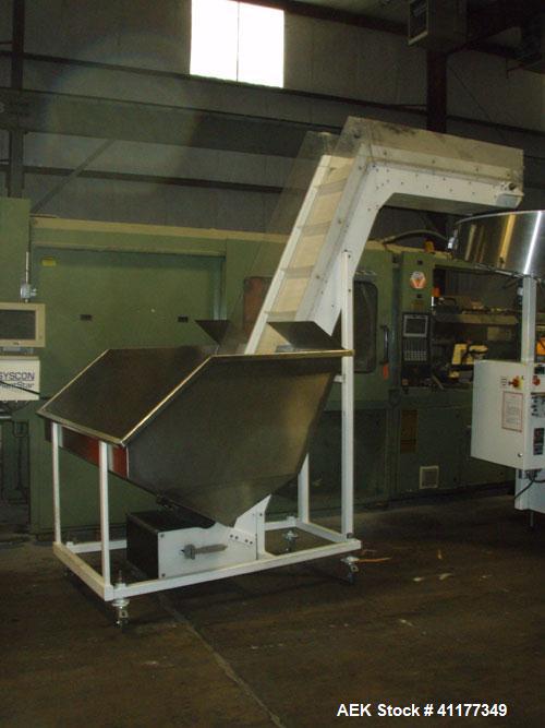 Used Omega Design Bulk Bottle Unscrambler, Model 4D-RP2-18. Capable of speeds over 250 BPM. Has exterior bottle air cleaner, bulk bottle elevator. 1/60/120V.