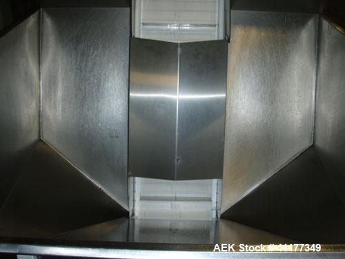 Used Omega Design Bulk Bottle Unscrambler, Model 4D-RP2-18. Capable of speeds over 250 BPM. Has exterior bottle air cleaner, bulk bottle elevator. 1/60/120V.