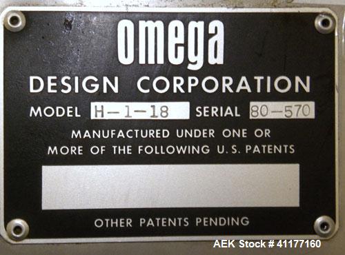 Used Omega Design feeder for Bottle Unscrambler,model H-1-18 bulk bottle elevator. Last running 15, 30, 60cc plastic bottles.