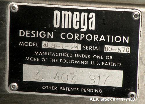 Used Omega Design feeder for Bottle Unscrambler,model H-1-18 bulk bottle elevator. Last running 15, 30, 60cc plastic bottles.