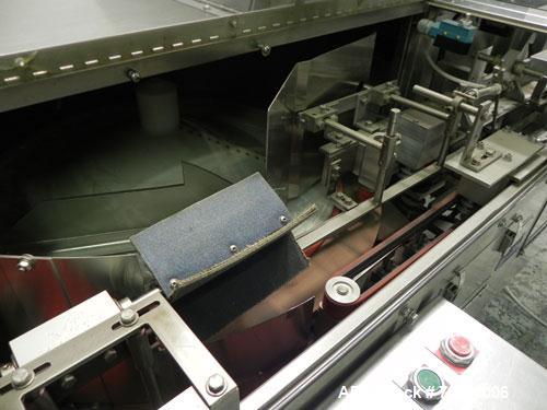 Used Pace Model M300 Pharmaceutical Bottle Unscrambler capable of speeds up to 250 containers per minute. Has bulk elevator and hopper, ionized air cleaner and all stainless steel construction. Conta...