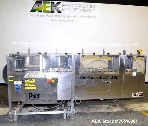 Used Pace Packaging Corporation Omni-Line Bottle Unscrambler, Model M400SS D, Stainless Steel. Capable of approximately 200 bottles per minute. Approximate  48” diameter disc, orientate belt.  3/60/4...