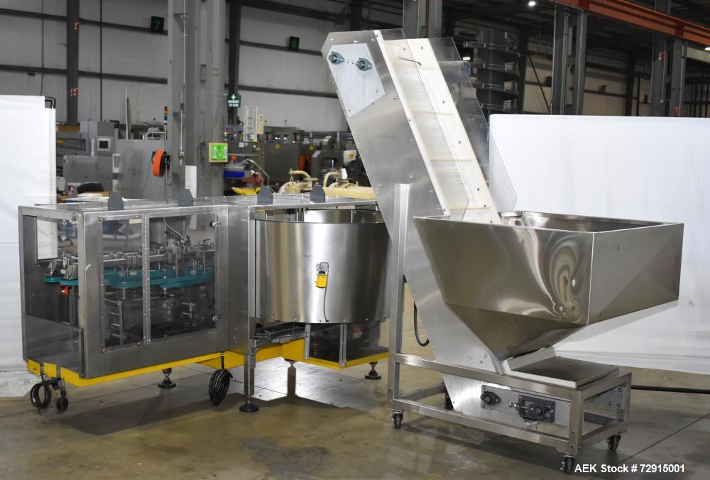 Used- Pace Packaging Bulk Bottle Unscrambler, Model M400. Capable of orienting approximately 20-350 bottles a minute, depend...