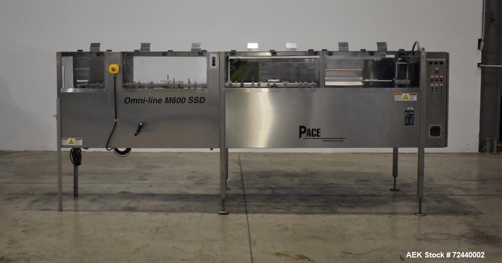 Used Pace Omni-Line Bulk Bottle Unscrambler, Model M600. Capable of speeds up to 500 bpm (depending on bottle). Bottle size range of .8 oz (25 ml) to 2.5 gallon (9.5L). Control panel with (4) Allen B...