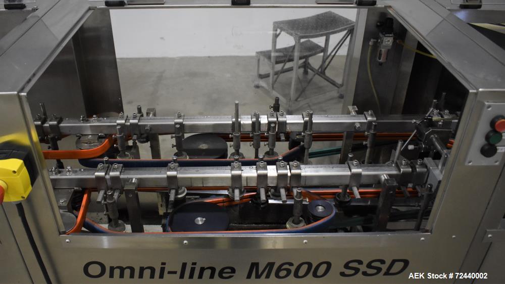 Used Pace Omni-Line Bulk Bottle Unscrambler, Model M600. Capable of speeds up to 500 bpm (depending on bottle). Bottle size range of .8 oz (25 ml) to 2.5 gallon (9.5L). Control panel with (4) Allen B...