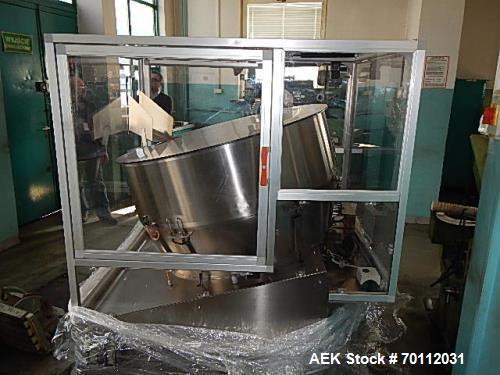 Used Ozaf Automatic Bottle Unscrambler, Model RO/1000. Speeds up to 110 bottles per minute. Ozaf E40V bottle hopper and elevator. Hopper capacity is 300 litres, level control in the hopper with low b...