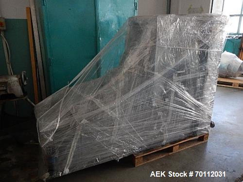 Used Ozaf Automatic Bottle Unscrambler, Model RO/1000. Speeds up to 110 bottles per minute. Ozaf E40V bottle hopper and elevator. Hopper capacity is 300 litres, level control in the hopper with low b...