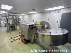 Used Kaps-All Model AU-6 Automatic Plastic Bottle Unscrambler. Capable of speeds up to 300 per minute, depending on size and...