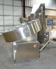 Used Ozaf AC/1500 Bottle Unscrambler, capacity approximately 170-180 units per minute. Includes an OZAF integrated elevator model E/10AG. SELLING PRICE AS IS, WHERE IS, SANFORD, NC.