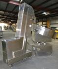 Used Ozaf AC/1500 Bottle Unscrambler, capacity approximately 170-180 units per minute. Includes an OZAF integrated elevator model E/10AG. SELLING PRICE AS IS, WHERE IS, SANFORD, NC.