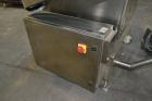 Used Ozaf AC/1500 Bottle Unscrambler, capacity approximately 170-180 units per minute. Includes an OZAF integrated elevator model E/10AG. SELLING PRICE AS IS, WHERE IS, SANFORD, NC.