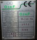Used Ozaf AC/1500 Bottle Unscrambler, capacity approximately 170-180 units per minute. Includes an OZAF integrated elevator model E/10AG. SELLING PRICE AS IS, WHERE IS, SANFORD, NC.