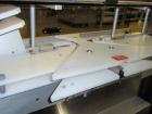 Used DT Kalish Kalisort 7400 bulk bottle unscrambler with DT Kalish model 999 inoized air cleaner bottle inverter and twin nozzle cleaning head, serial# 0001. (1) DT Kalish unscrambler, model 7400. I...