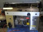 Used DT Kalish Kalisort 7400 bulk bottle unscrambler with DT Kalish model 999 inoized air cleaner bottle inverter and twin nozzle cleaning head, serial# 0001. (1) DT Kalish unscrambler, model 7400. I...