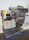 Used Kaps-All AU3 Bulk Bottle Unscrambler. Capable of speeds up to 150 bottles per minute. Bottle size range: (height) 1/2