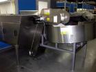 Used Kapsall Model AU6 bulk bottle unscrambler with integrated bottle elevator. Low profile design. Can Orient bottles from 1/16 oz to Gallons with proper changeparts. Last running 8/16 oz bottle wat...