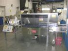 Used Kapsall Model AU6 bulk bottle unscrambler with integrated bottle elevator. Low profile design. Can Orient bottles from 1/16 oz to Gallons with proper changeparts. Last running 8/16 oz bottle wat...