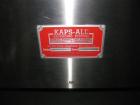 Used Kapsall Model AU6 bulk bottle unscrambler with integrated bottle elevator. Low profile design. Can Orient bottles from 1/16 oz to Gallons with proper changeparts. Last running 8/16 oz bottle wat...