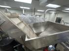 Used New England High Speed Bulk Bottle Unscrambler, Model NEHAE-60. Capable of speeds up to 400 containers per minute (depending on bottle size and configuration). Container size range: 5/8