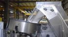 Used New England Machinery Model NEHCL-200AJ Bulk Bottle Unscrambler. Machine is capable of speeds up to 200 bottles per minute. Container size range: Diameter 5/8
