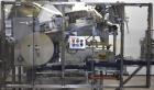 Used New England Machinery Model NEHCL-200AJ Bulk Bottle Unscrambler. Machine is capable of speeds up to 200 bottles per minute. Container size range: Diameter 5/8
