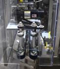 Used New England Machinery Model NEHCL-200AJ Bulk Bottle Unscrambler. Machine is capable of speeds up to 200 bottles per minute. Container size range: Diameter 5/8