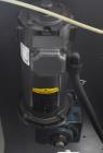 Used New England Machinery Model NEHCL-200AJ Bulk Bottle Unscrambler. Machine is capable of speeds up to 200 bottles per minute. Container size range: Diameter 5/8