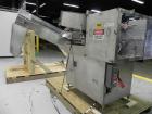 Used New England Model NEHCL-250AJ Bulk Bottle Unscrambler. Has integrated ionized air cleaner. Was last running 45 cc and 60 cc plastic pharmaceutical grade bottles. Includes New England model H/E-1...