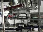 Used New England Model NEHCL-250AJ Bulk Bottle Unscrambler. Has integrated ionized air cleaner. Was last running 45 cc and 60 cc plastic pharmaceutical grade bottles. Includes New England model H/E-1...