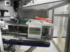 Used New England Model NEHCL-250AJ Bulk Bottle Unscrambler. Has integrated ionized air cleaner. Was last running 45 cc and 60 cc plastic pharmaceutical grade bottles. Includes New England model H/E-1...